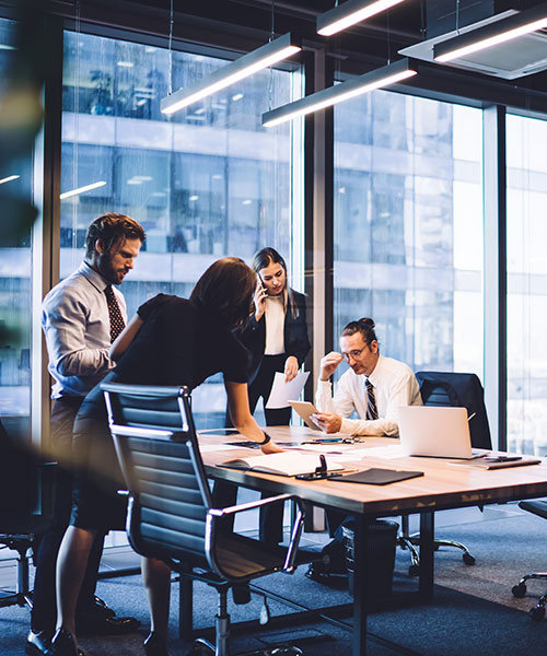 A group of bankers discussing in a meeting room